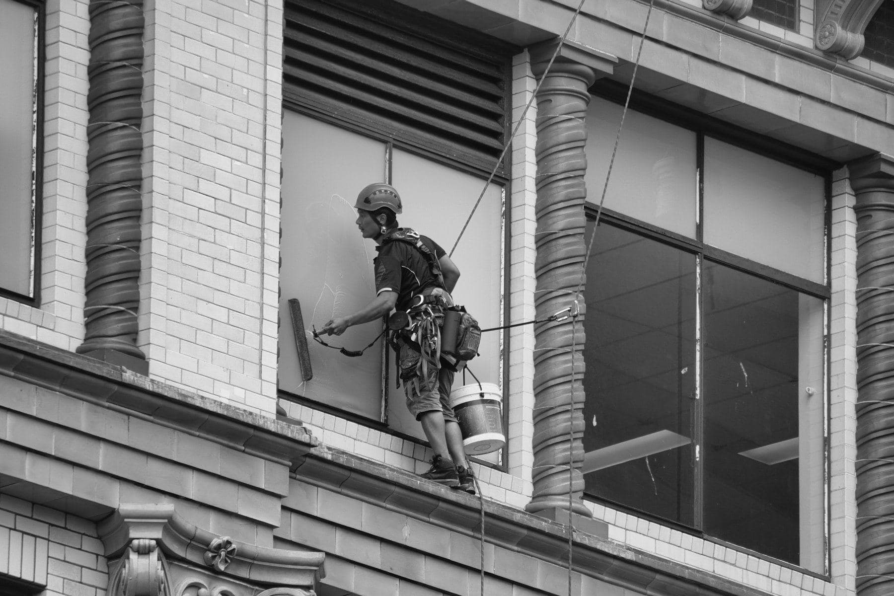 Technicians on a building facade